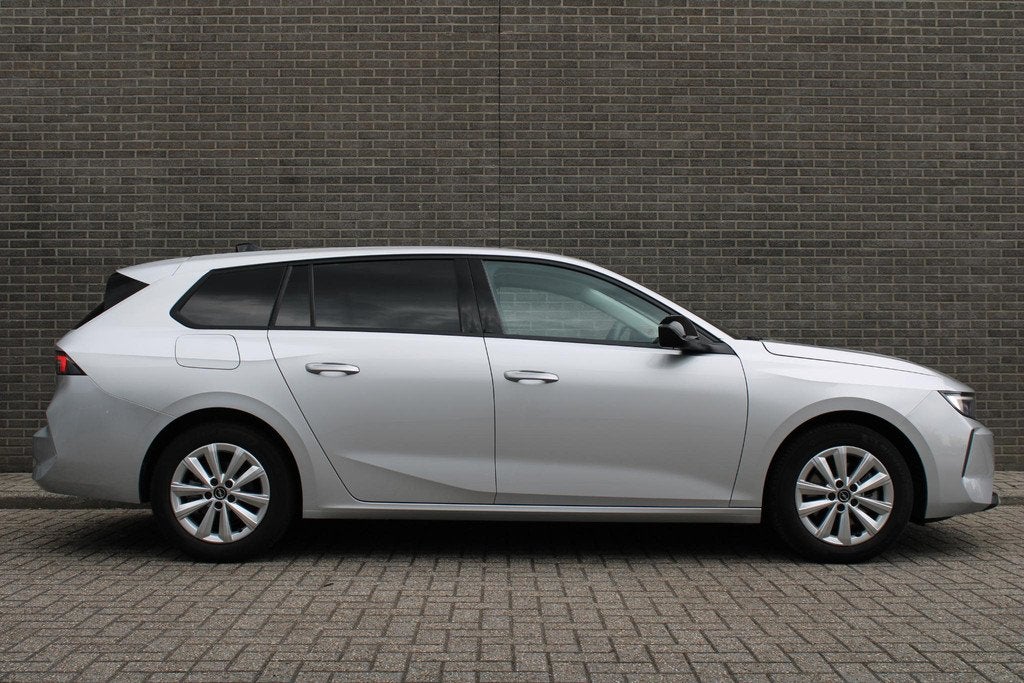 Opel Astra Sports Tourer 1.2 Level 2 Cruise en Climate Contr, Voorwielaandrijving, 12 maanden, Stof, Gebruikt