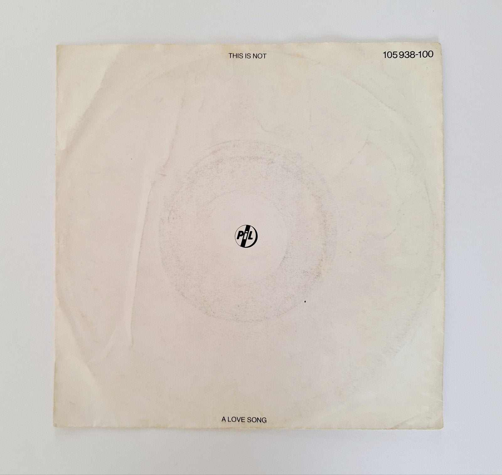 Vinyl 7" single PIL - This Is Not A Love Song, Gebruikt, Overige genres, 7 inch, Ophalen of Verzenden