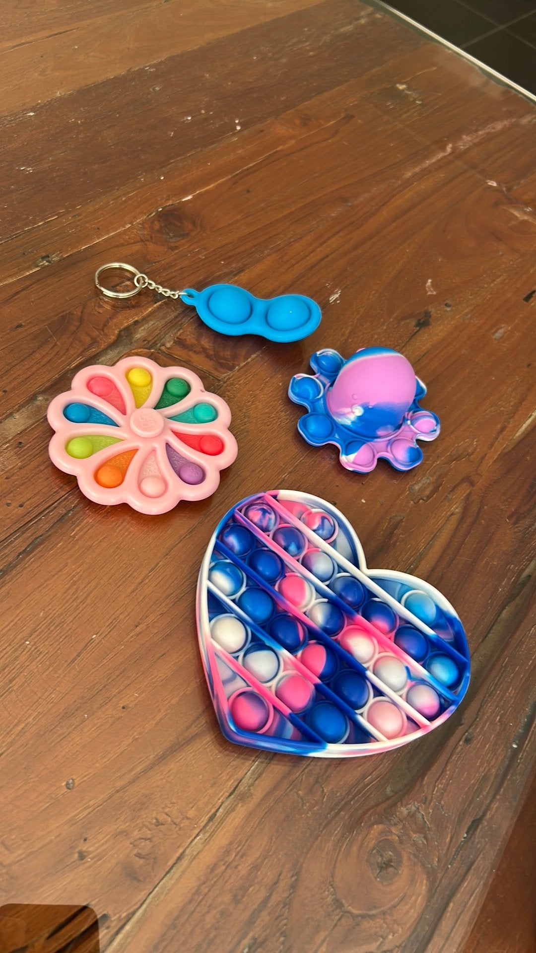 Pop its 4 set  sleutelhanger hartjes fidget spinner octopus, Ophalen of Verzenden, Gebruikt