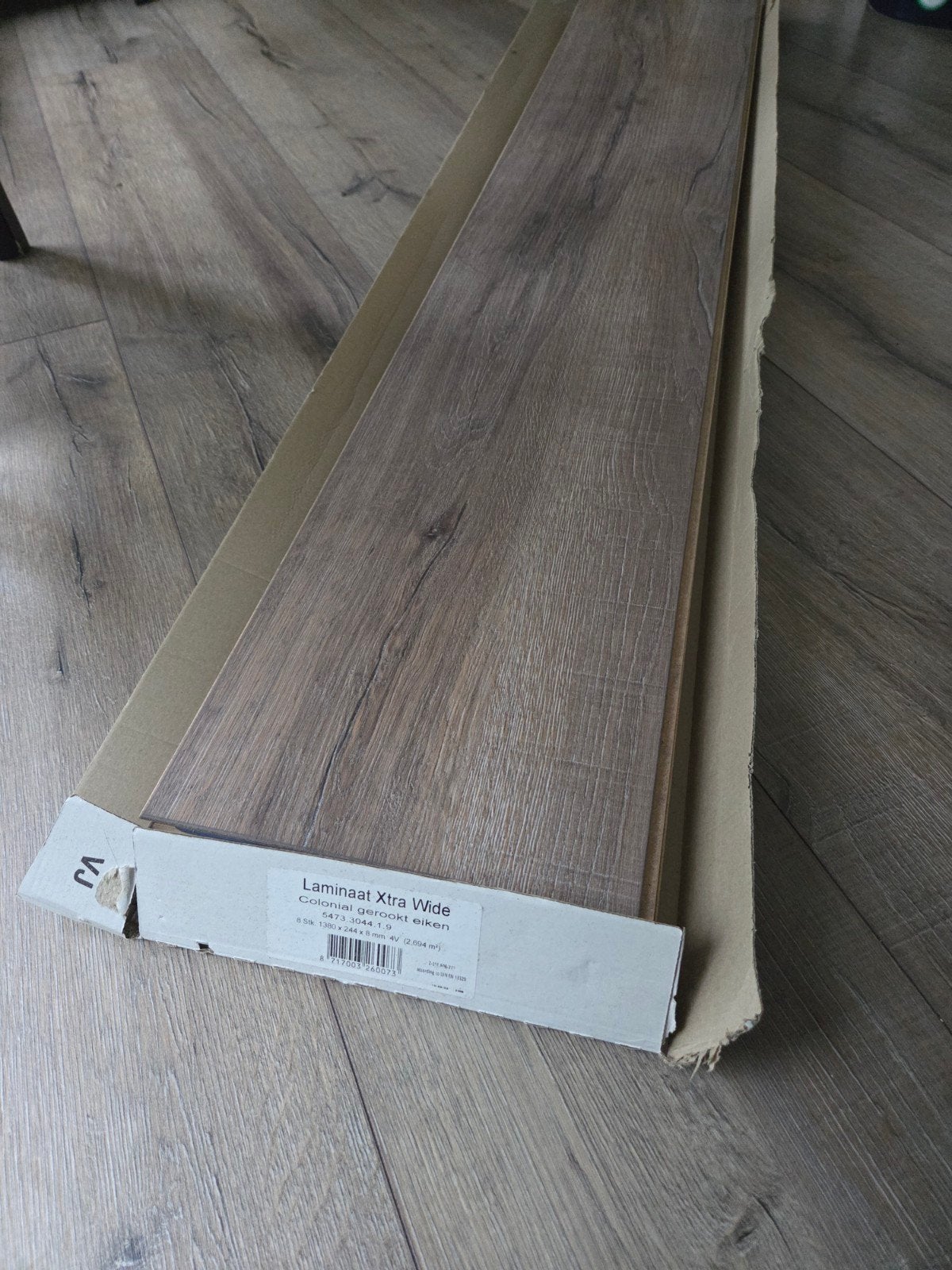 Lichte laminaatvloer, ongeveer 50m2, Ophalen, Gebruikt, 50 tot 150 cm, 10 m² of meer