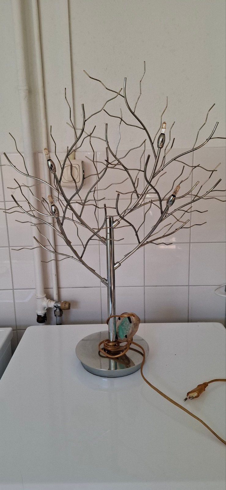 van den heg takken lamp, Ophalen