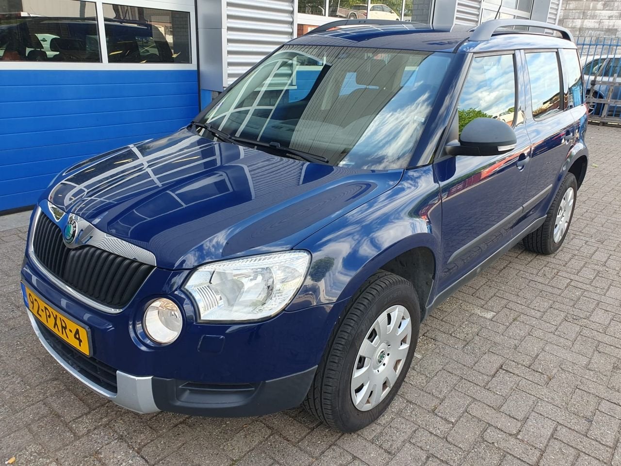 Skoda Yeti 1.2 TSI Comfort (bj 2011), Auto's, Elektrische ramen, Blauw, Stationwagon, Onderhoudsboekje