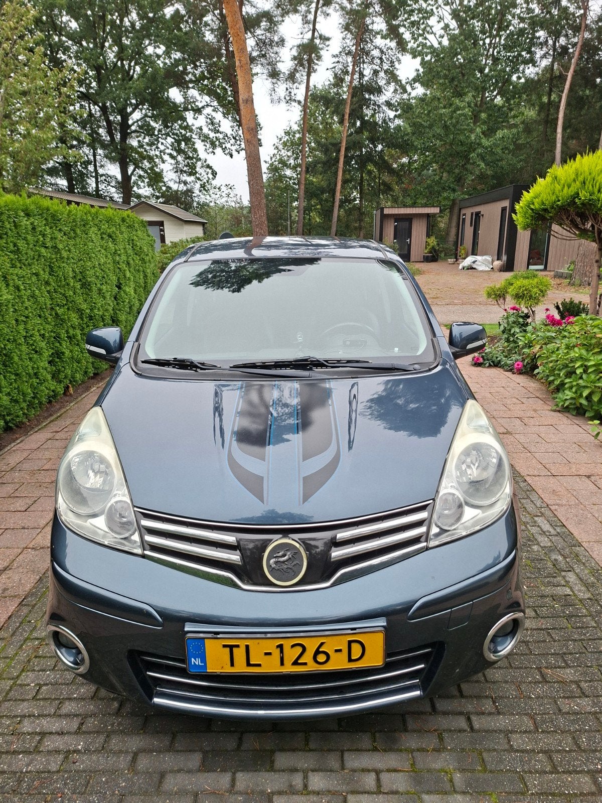 Foto 3 van nissan note 1.4 groen perfect onderhouden.