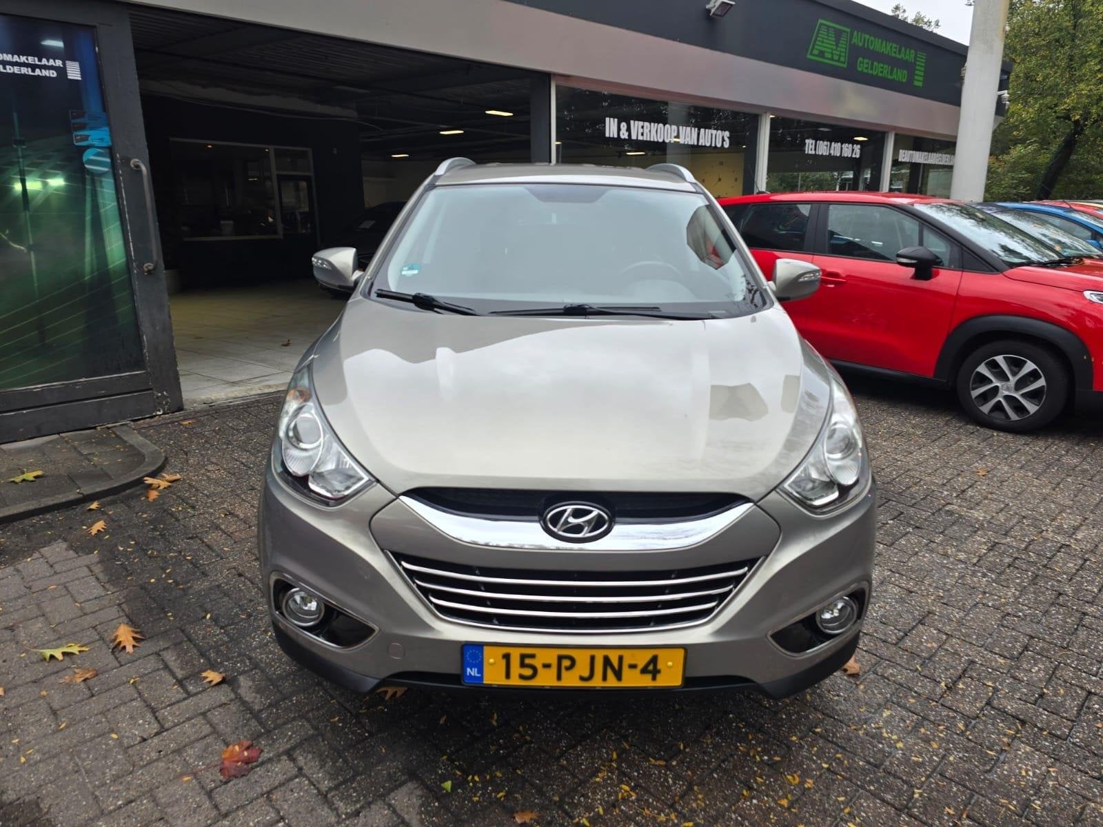 Hyundai ix35 2.0i 4WD Style | 1E EIGENAAR | NAVI | TREKHAAK, 13 km/l, Gebruikt, 4 cilinders, Leder en Stof