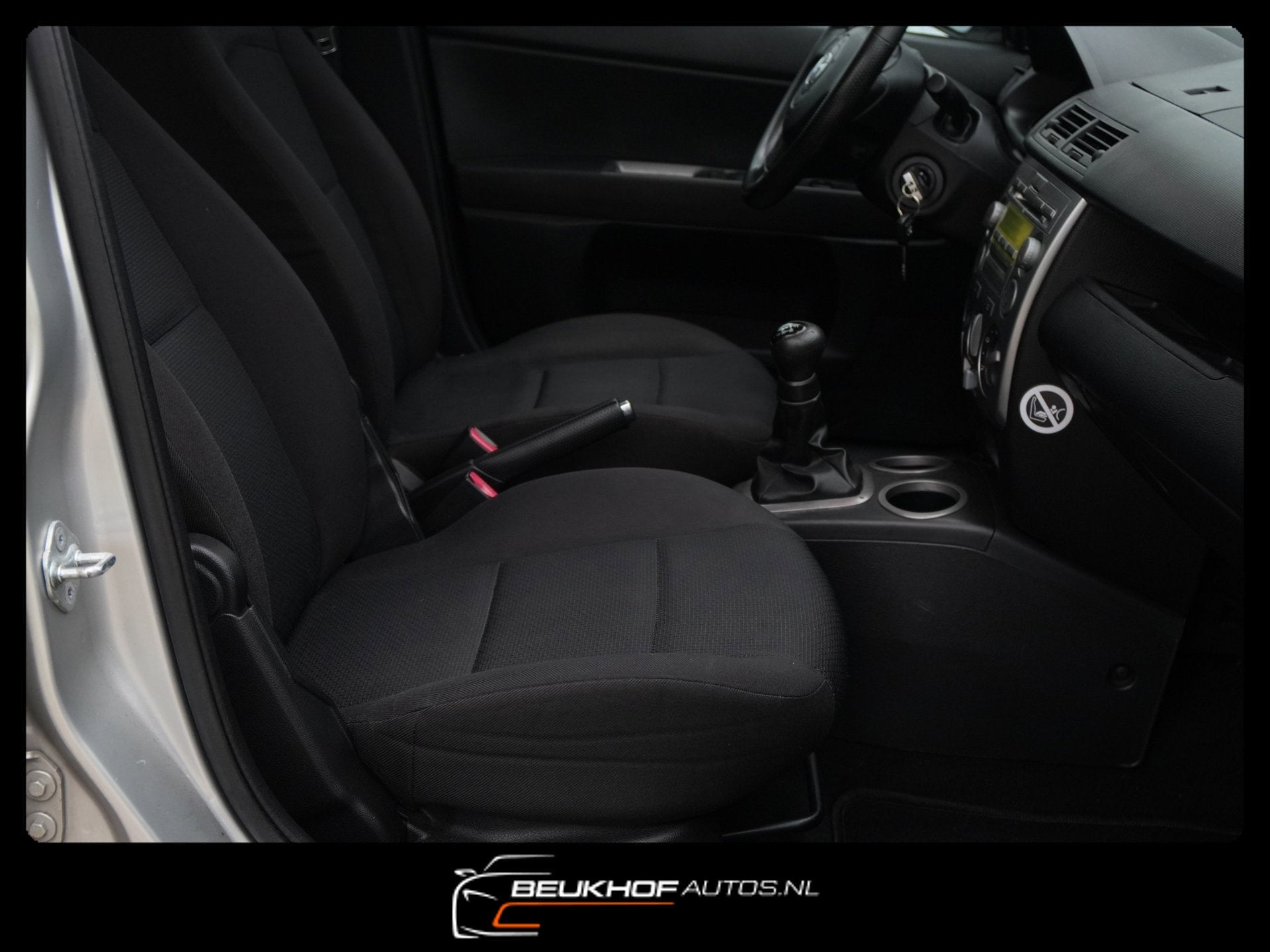 Mazda 2 1.4 Exclusive 5dr Automaat Airco Trekhaak Sportvelg, Auto's, Stof, Gebruikt, Zwart, 4 cilinders