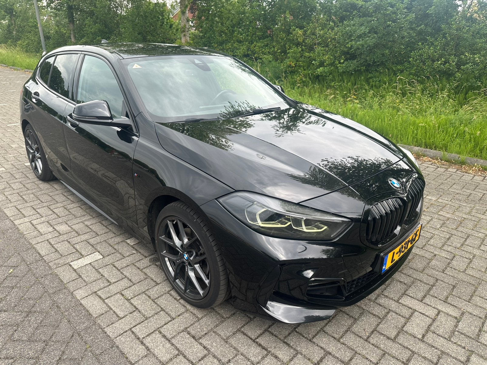 BMW 118i Aut/M Sportpakket/Leder/M Sportstoelen/BMW Garantie, 136 pk, Navigatiesysteem, Zwart, Particulier