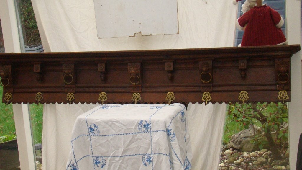 Antieke houten kapstok met gesneden leeuwenkoppen, Ophalen of Verzenden