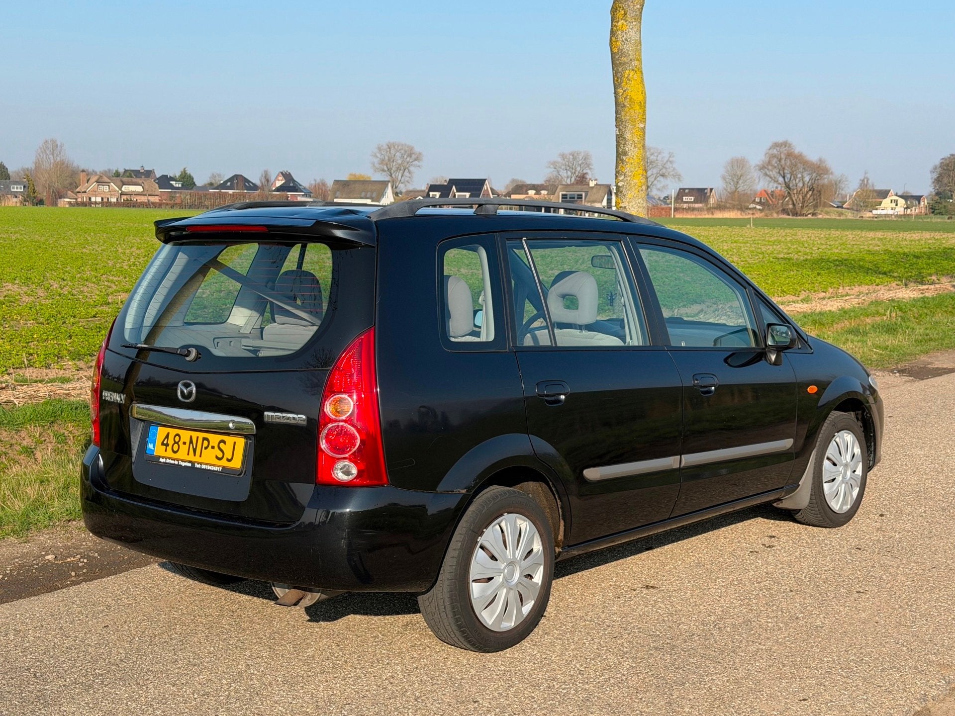 Mazda Premacy 2.0i Active Airco NAP APK 03-2027, Auto's, Stof, Gebruikt, Zwart, 4 cilinders