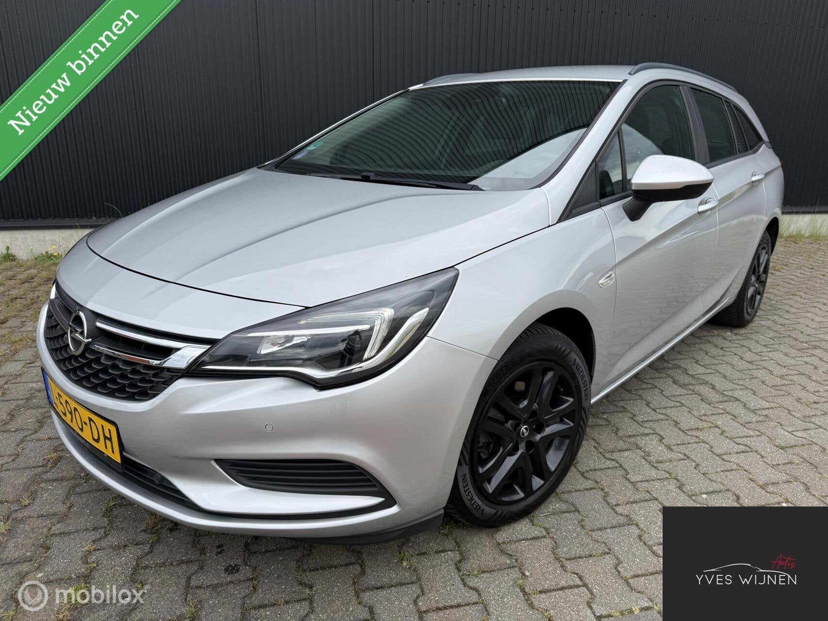 Opel Astra Sports Tourer 1.4TURBO 150pk PDC TREKHAAK NAVI, Voorwielaandrijving, Stof, Gebruikt, Handgeschakeld