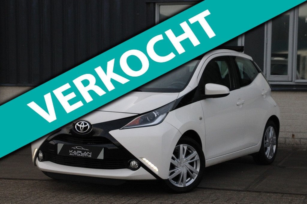 Toyota Aygo 1.0 X-Wave Cabrio Cruise H-Leder ParkCam BT Airc, Auto's, Voorwielaandrijving, Gebruikt, Zwart, Cabriolet