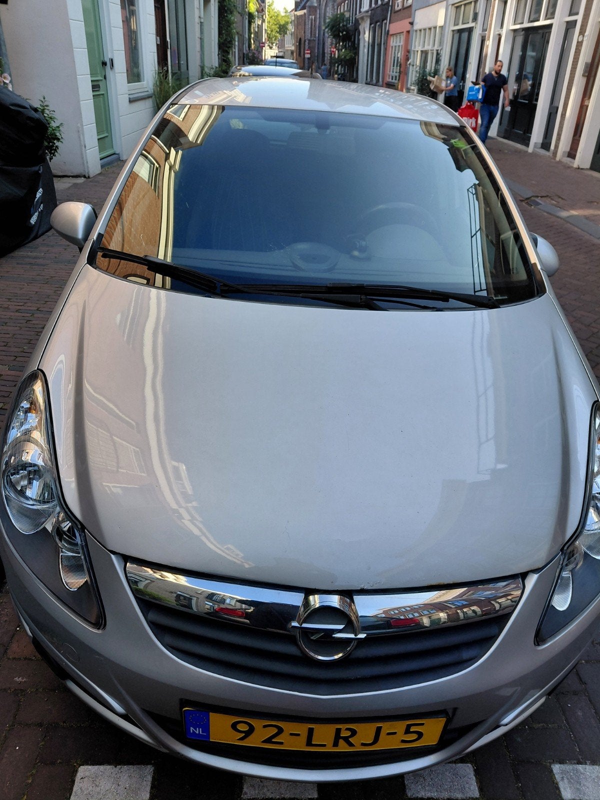 Opel Corsa 1.4 16V 5D 2010 Grijs, Auto's, Voorwielaandrijving, 1063 kg, 1398 cc, 4 cilinders