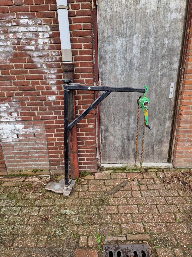 Hefkraan voor bestelwagen/bus met kettingtakel, Ophalen
