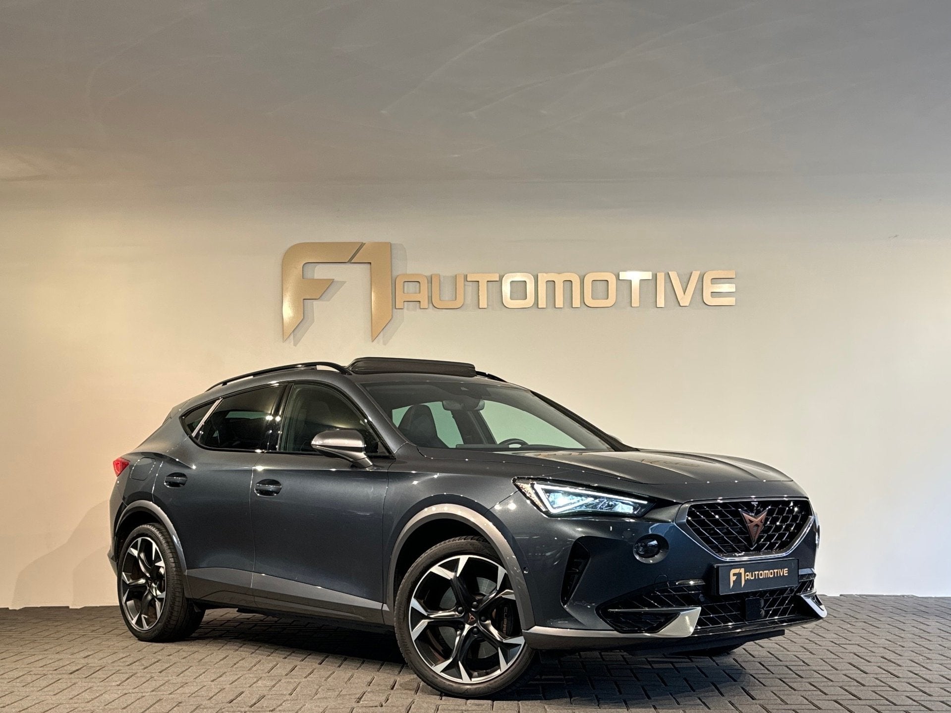 Cupra Formentor 1.4 e-Hybrid VZ Copper Edition Pano|Memory|3, Auto's, Dealer onderhouden, Gebruikt, Euro 6, 4 cilinders