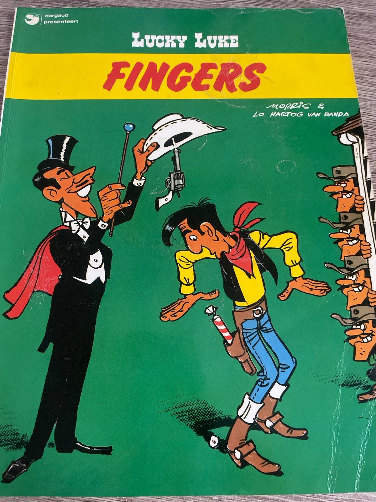 Lucky Luke - Fingers - Dargaud presenteert, Eén stripboek, Ophalen of Verzenden, Gelezen