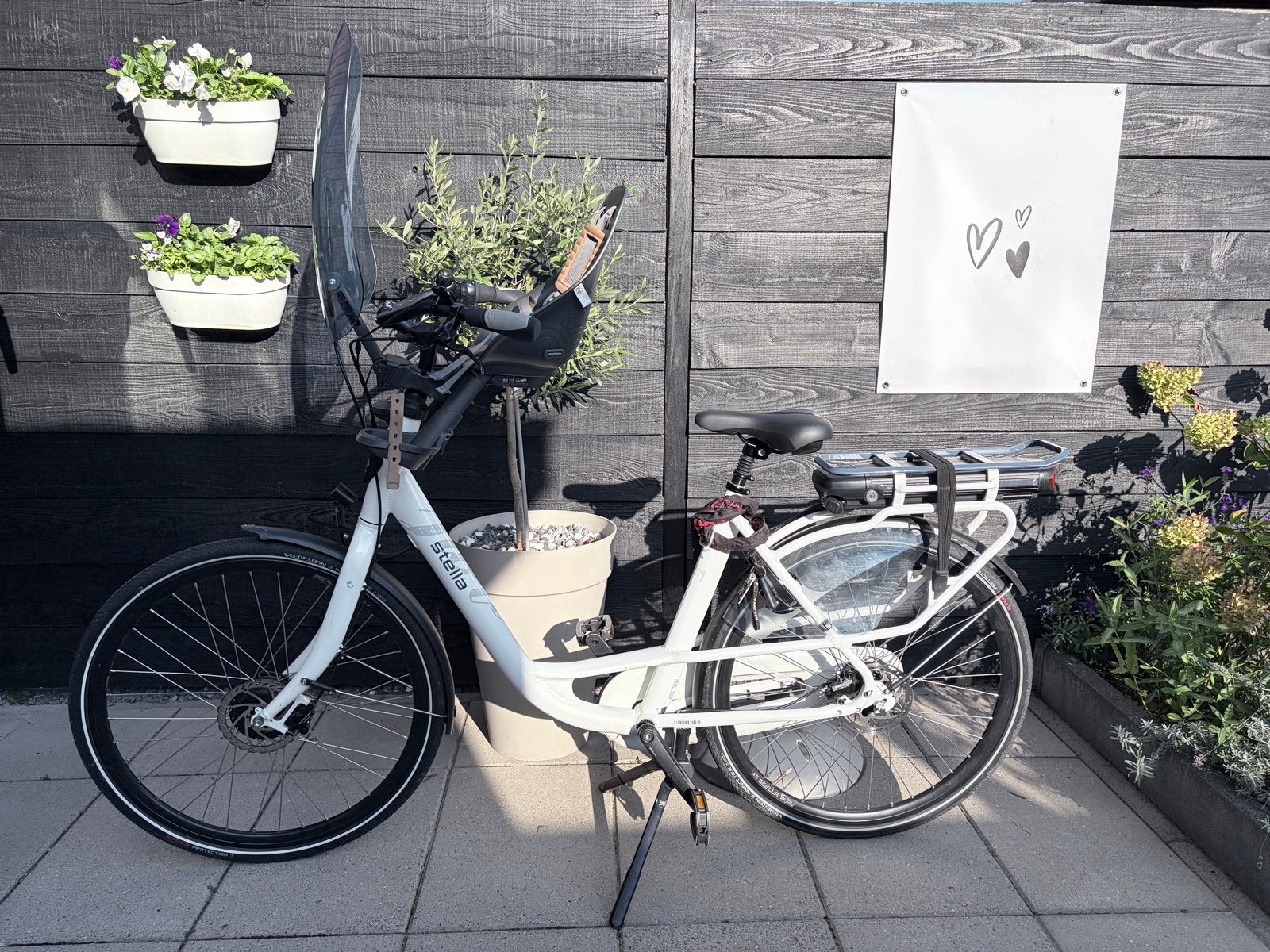 Stella elektrische moederfiets met zitje en windscherm, Gebruikt, Dubbele standaard, 1 zitje, Ophalen