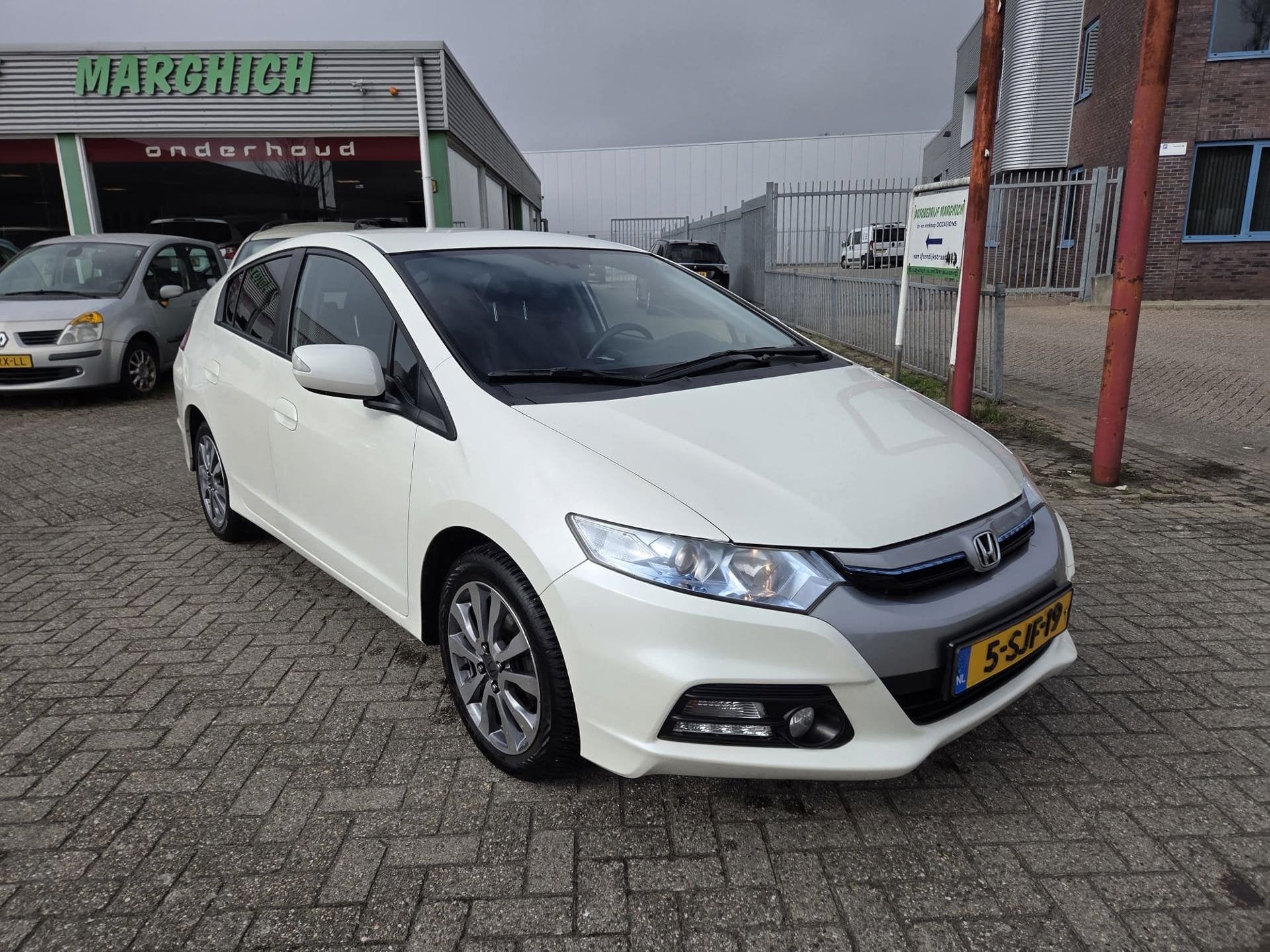 Honda Insight 1.3 Exclusive /HYBRIDE/Automaat/Clima/Cruise/L, Auto's, Gebruikt, 4 cilinders, Leder en Stof, Bedrijf