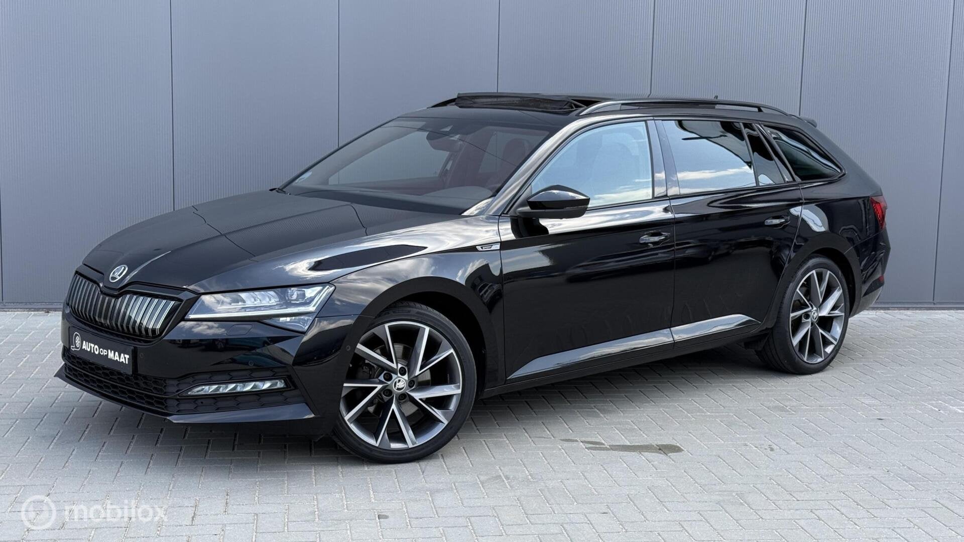Skoda Superb Combi 1.4 TSI iV Sportline Pano Trekhaak, Auto's, Zwart, 4 cilinders, Alcantara, Zwart