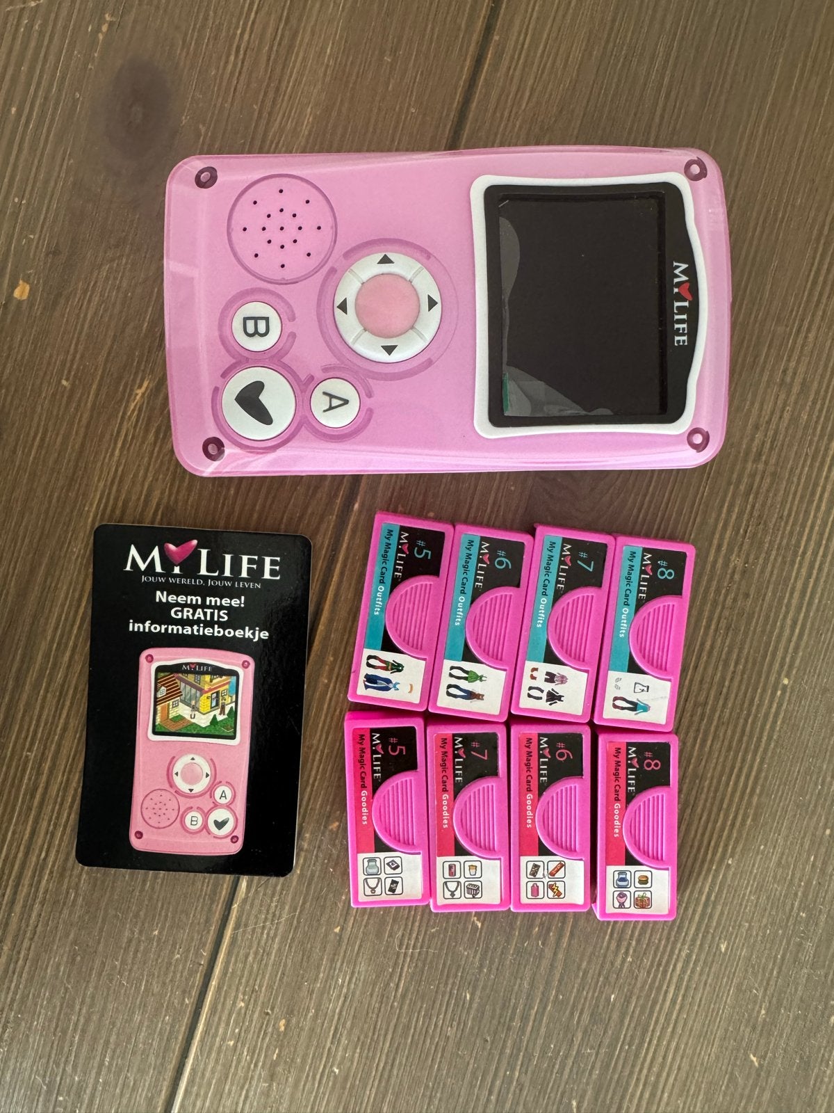 My Life Handheld Game met 8 spelkaarten - Roze, Spelcomputers en Games, 1 speler, Ophalen of Verzenden, Zo goed als nieuw, Vanaf 3 jaar