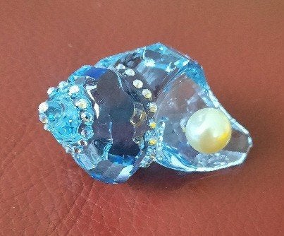 Swarovski scs idyllia hoornschelp met parel, Verzamelen, Swarovski, Ophalen of Verzenden, Figuurtje