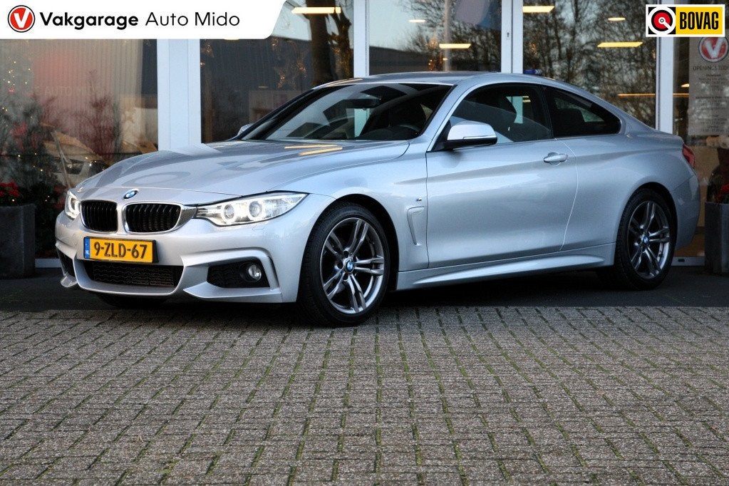 BMW 4 Serie Coupé 420i Automaat High Executive M-sportpakke, Auto's, BMW, 12 maanden, Gebruikt, 4 stoelen, 184 pk