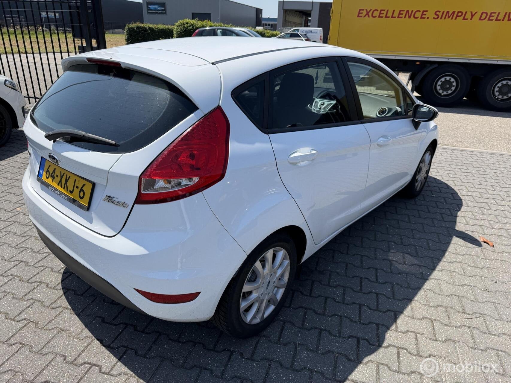 Ford Fiesta 1.6 TDCi ECOnetic Lease Trend, Auto's, Ford, Voorwielaandrijving, Stof, Gebruikt, Zwart
