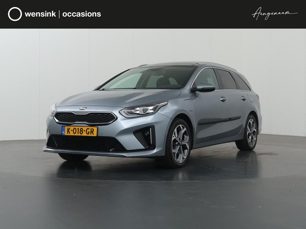 Kia Ceed Sportswagon 1.6 GDI PHEV ExecutiveLine | Trekhaak |, Auto's, Kia, Gebruikt, Zilver of Grijs, 1300 kg, Lichtsensor