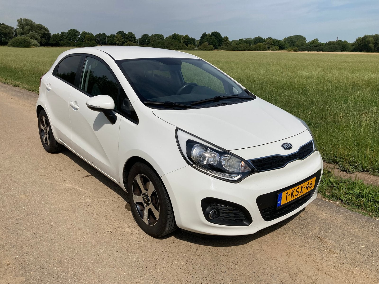 Kia Rio 1.2, Nieuwe APK, 5DRS 2013 Wit Zuinig, Ophalen, Zo goed als nieuw