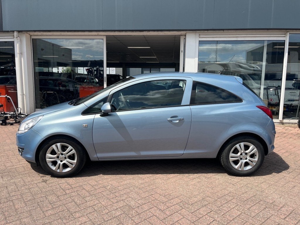 Opel CORSA 1.4 16V Edition Airco Cruise PDC, Gebruikt, Blauw, Bedrijf, Handgeschakeld