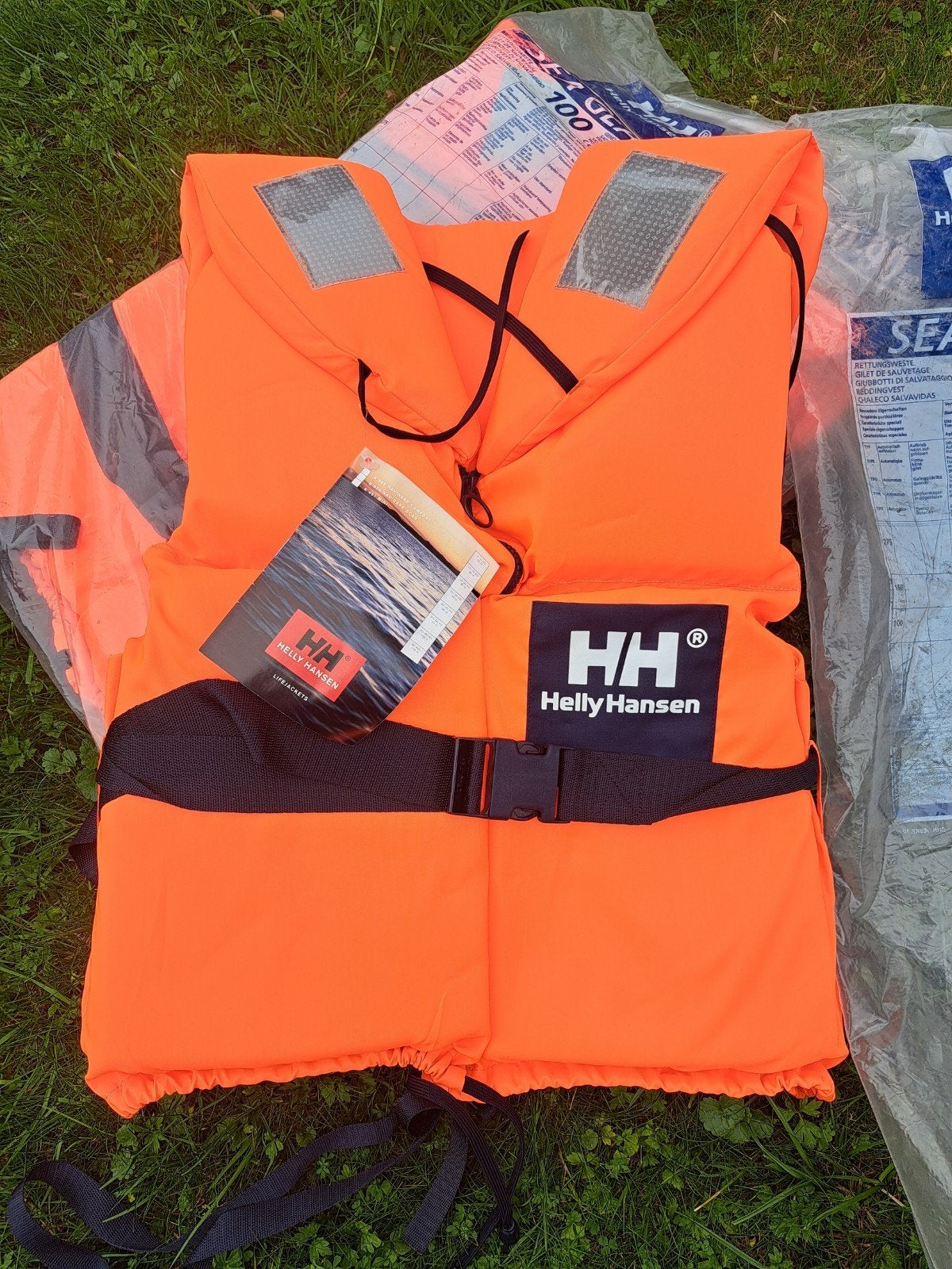 Nieuw Helly Hansen reddingsvest 100N (60-90kg) met fluit, Watersport en Boten, Ophalen of Verzenden