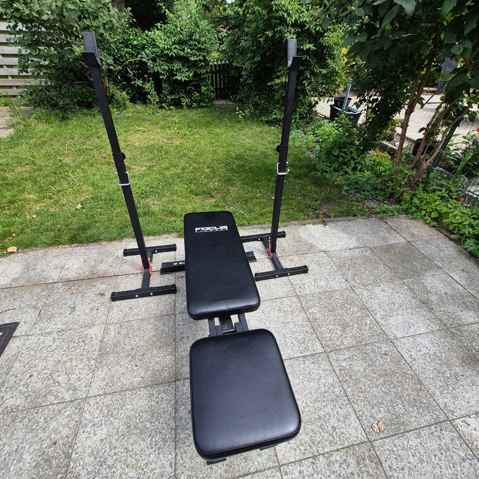 Verstelbare halterbank met squat rack, Ophalen