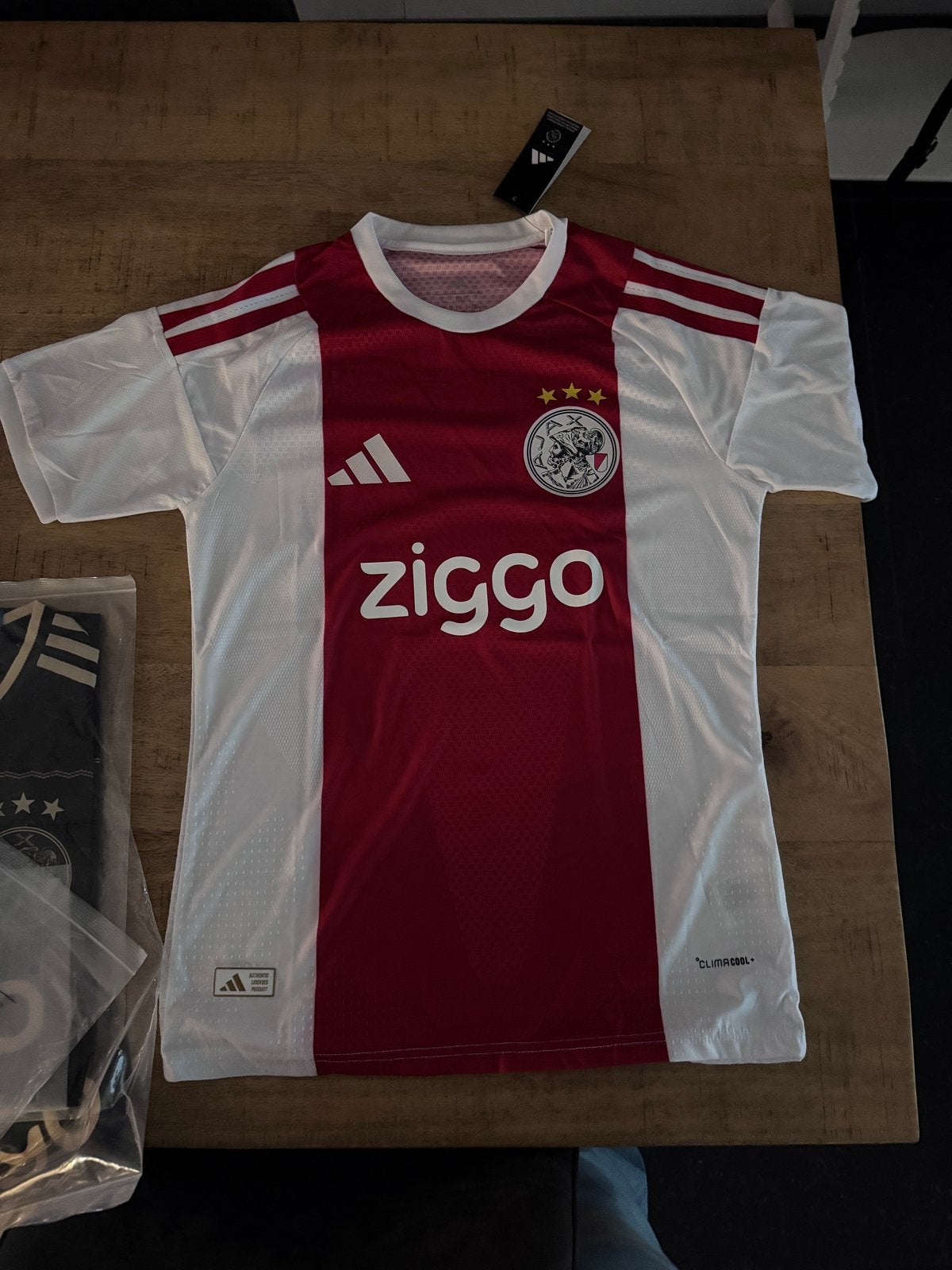 Ajax Thuisshirt 2026/2027 - Nieuw met kaartjes, Maat 52/54 (L), Nieuw, Ophalen of Verzenden, Voetbal