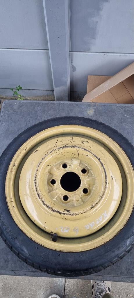 Mazda thuiskomer, geel stalen velg, Ophalen of Verzenden