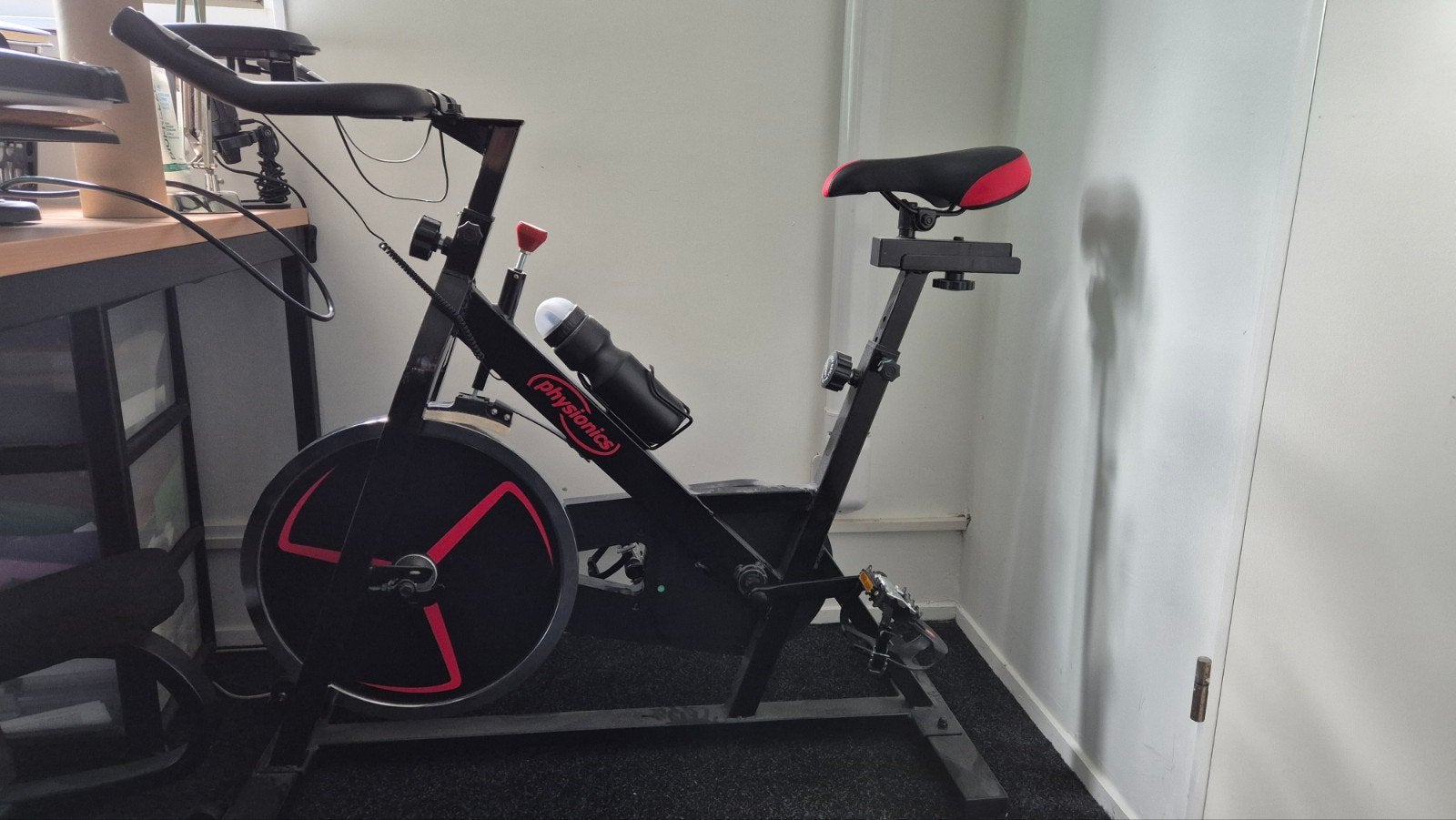 Physionics Spinningfiets - Zwart/Rood, Ophalen, Gebruikt, Spinningfiets, Metaal