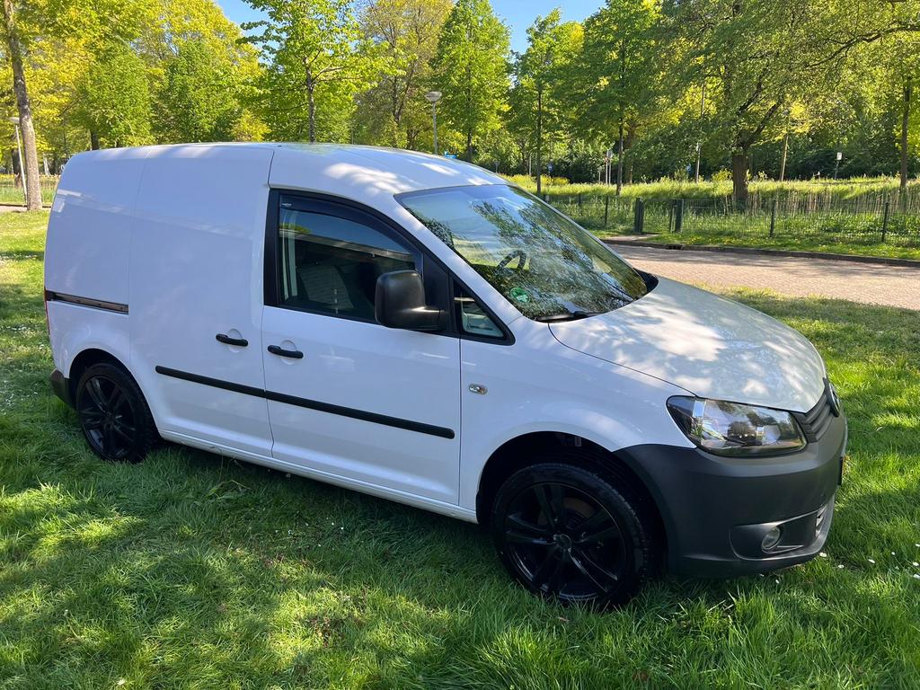 Mooie Volkswagen caddy 2014 met trekhaak toppertje!!!!!, Zwart, 4 cilinders, Leder en Stof, Wit