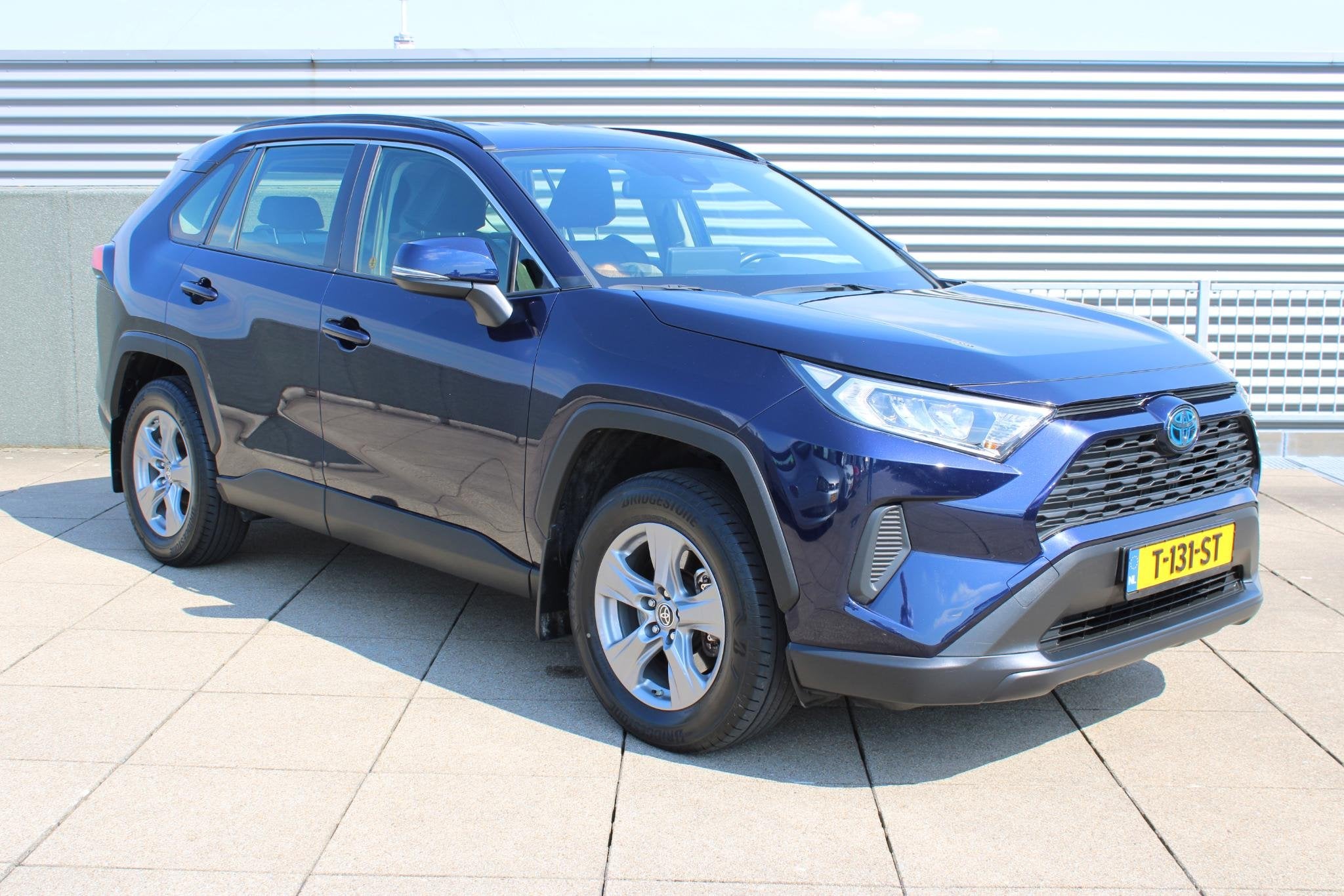 Toyota RAV4 2.5 Hybrid Business Navigatie / Leder / Trekhaak, Gebruikt, 4 cilinders, 2487 cc, Blauw