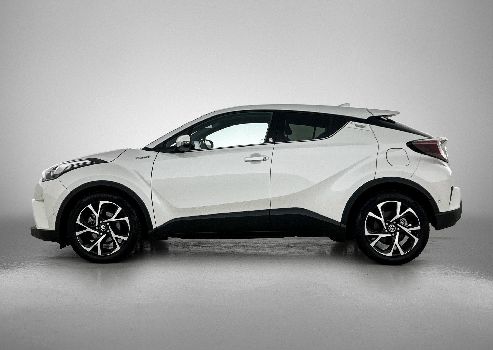 Toyota C-HR 1.8 Hybrid Style | PDC | (bj 2019, automaat), Auto's, 12 maanden, Stof, 4 cilinders, Bedrijf