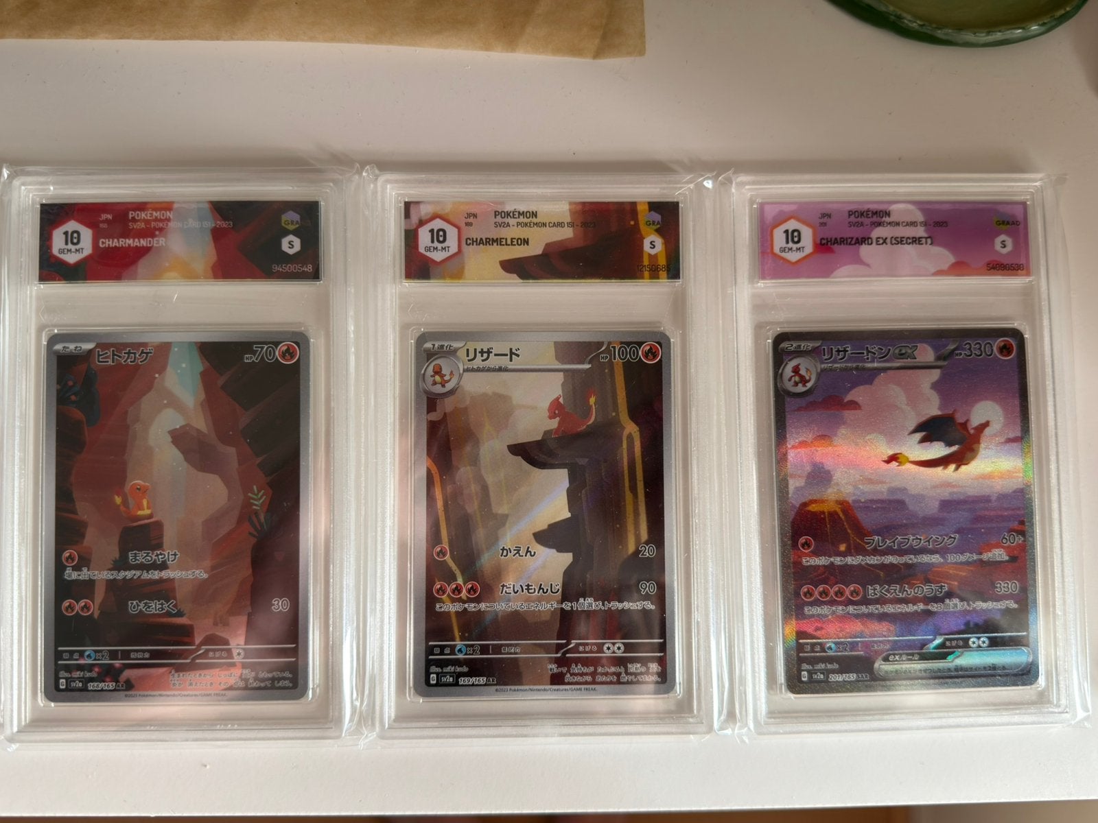 Charizard Evo line 151 graded in Gem 10, Ophalen of Verzenden, Zo goed als nieuw