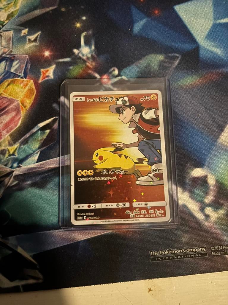Red's Pikachu Pokémon Kaart zie beschrijving - Japanse Promo, Ophalen of Verzenden, Zo goed als nieuw, Losse kaart