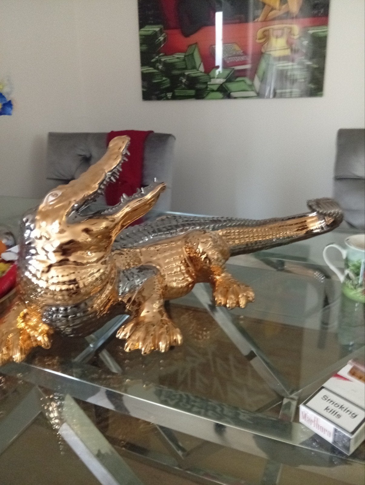 Gouden/zilveren krokodil van porselein, Ophalen