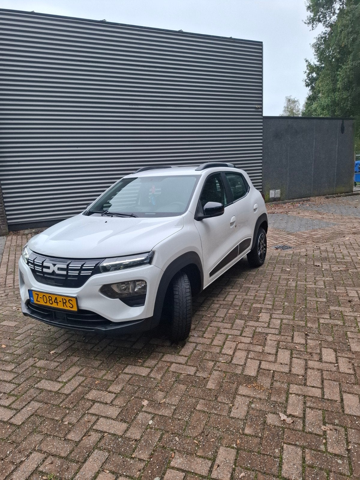 Dacia Spring Electric 45 2022 Wit FACELIFT model nieuwe logo, Auto's, 38 min, 4 stoelen, Wit, Elektrisch
