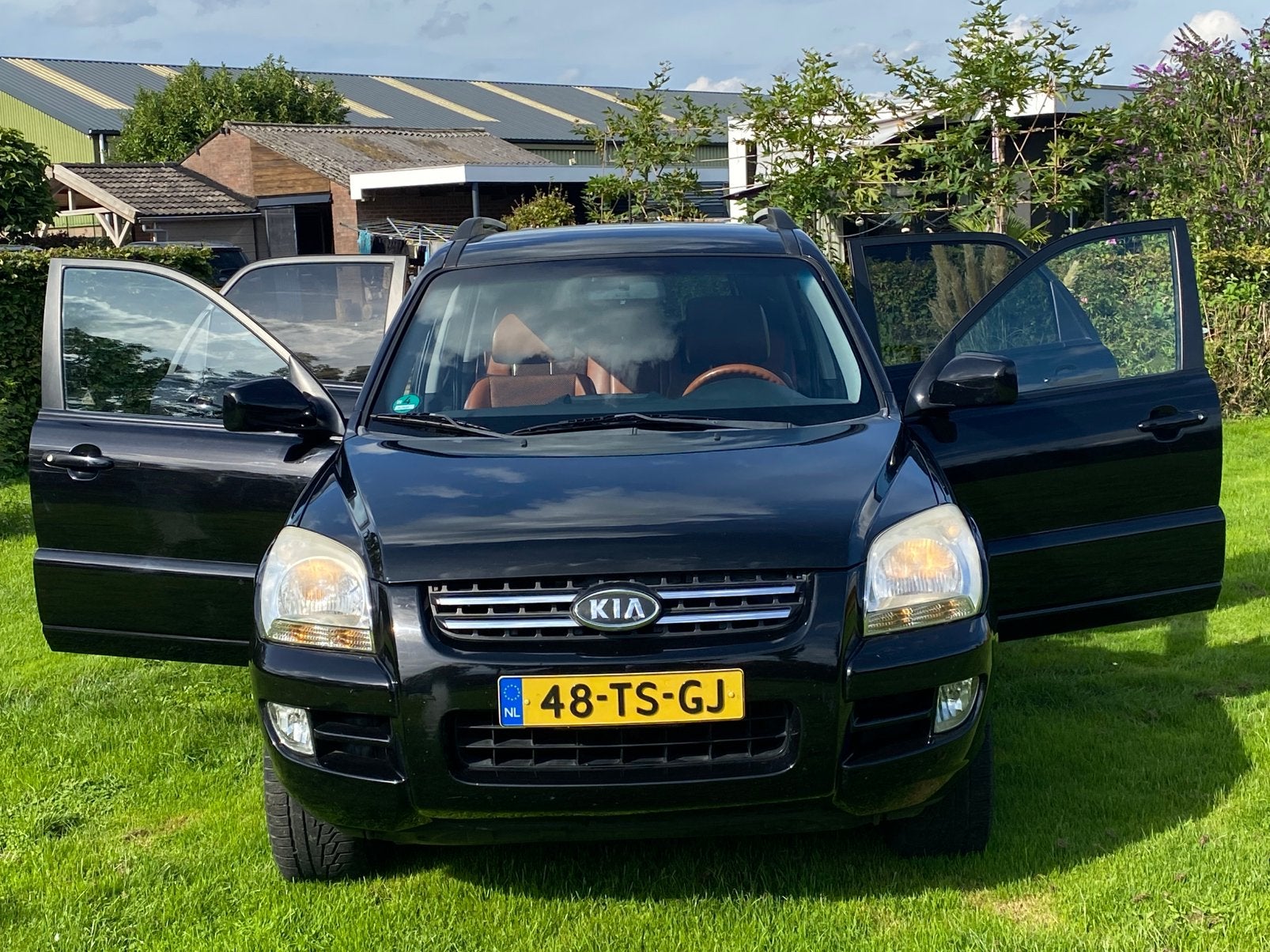 Kia Sportage 2.0 2WD 2007 Zwart, Auto's, 1442 kg, 4 cilinders, Zwart, Origineel Nederlands