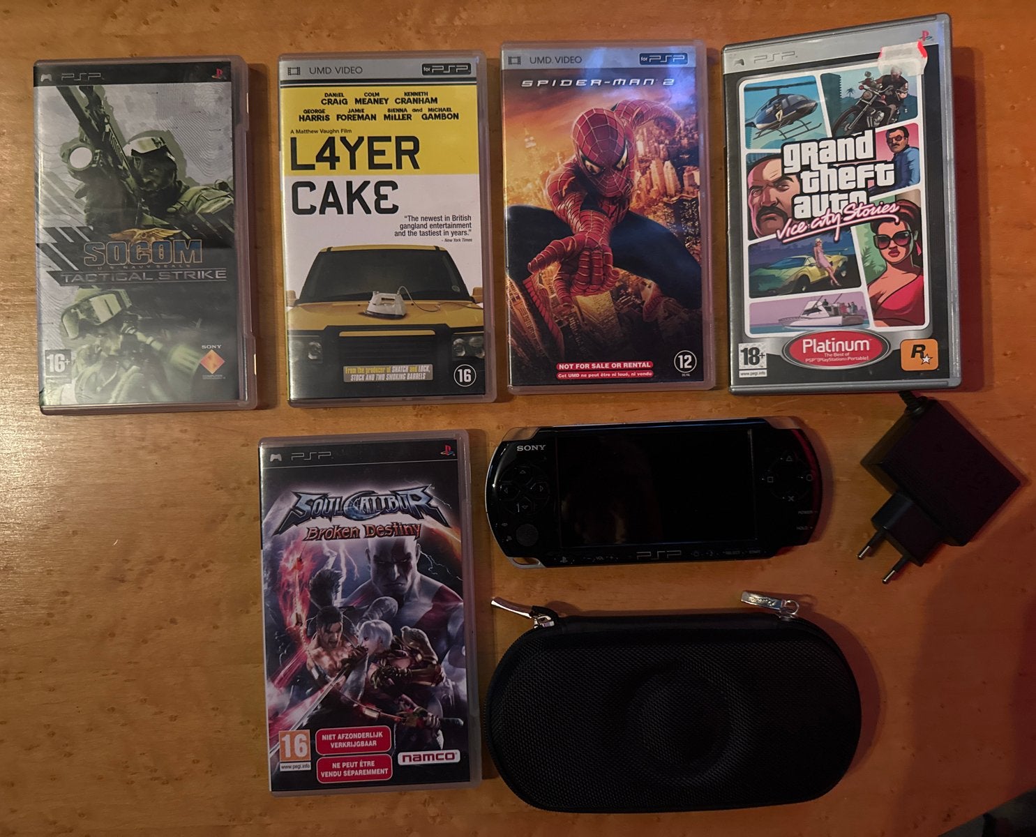 Sony PSP + 3 games + 2 UMD films + oplader & hoes – werkend, Ophalen of Verzenden, Gebruikt, Met games, PSP 3000