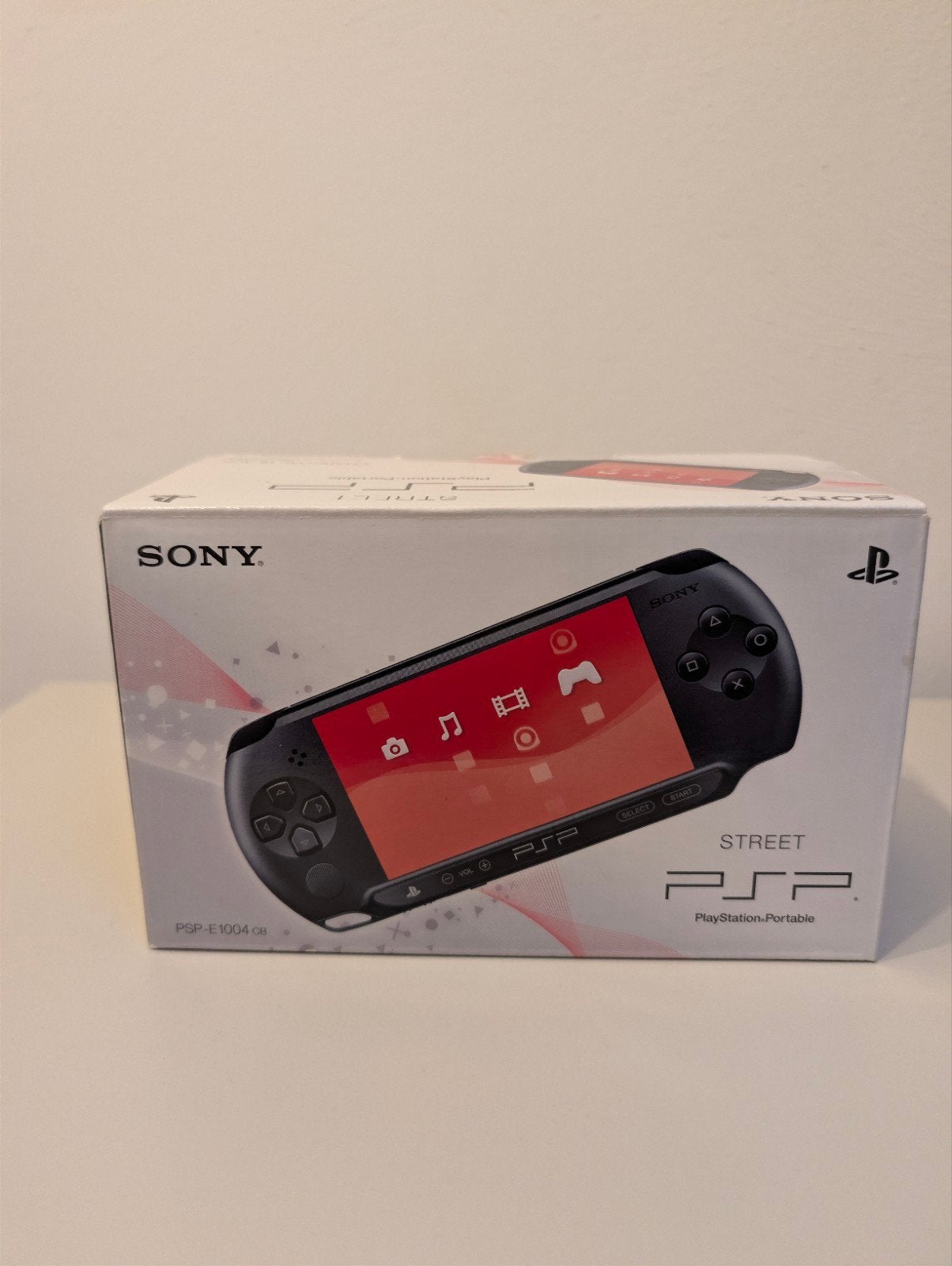 Sony PSP Street E1004 CB - Zo goed als nieuw, Spelcomputers en Games, Ophalen, Zo goed als nieuw, Zwart, Overige modellen