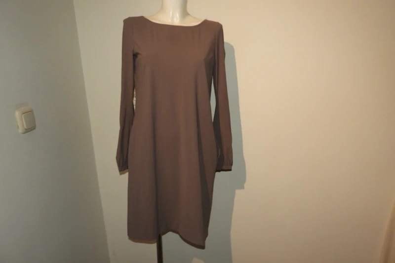 Ladress by Simone stretch travel stof jurk plooitjes rug