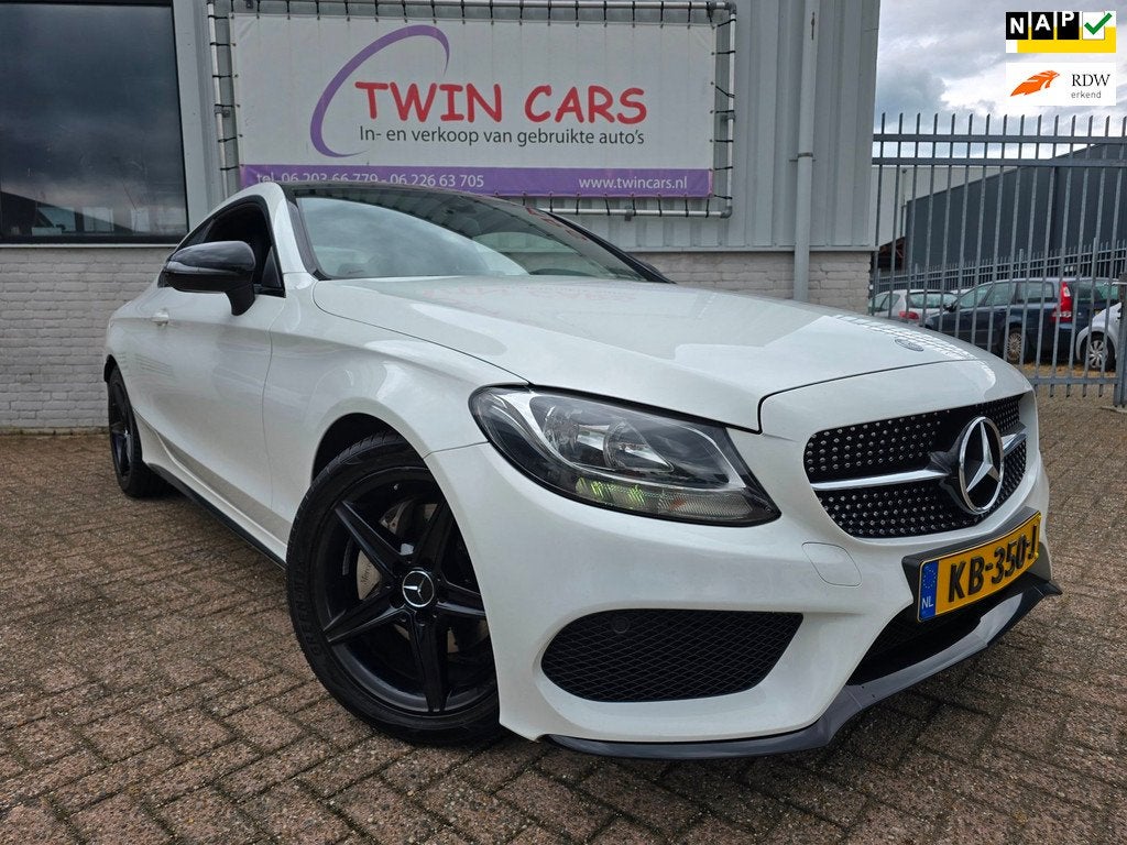 Mercedes-Benz C-klasse Coupé 180 AMG NIGHT NAVI, Auto's, Achterwielaandrijving, Gebruikt, 4 stoelen, Wit
