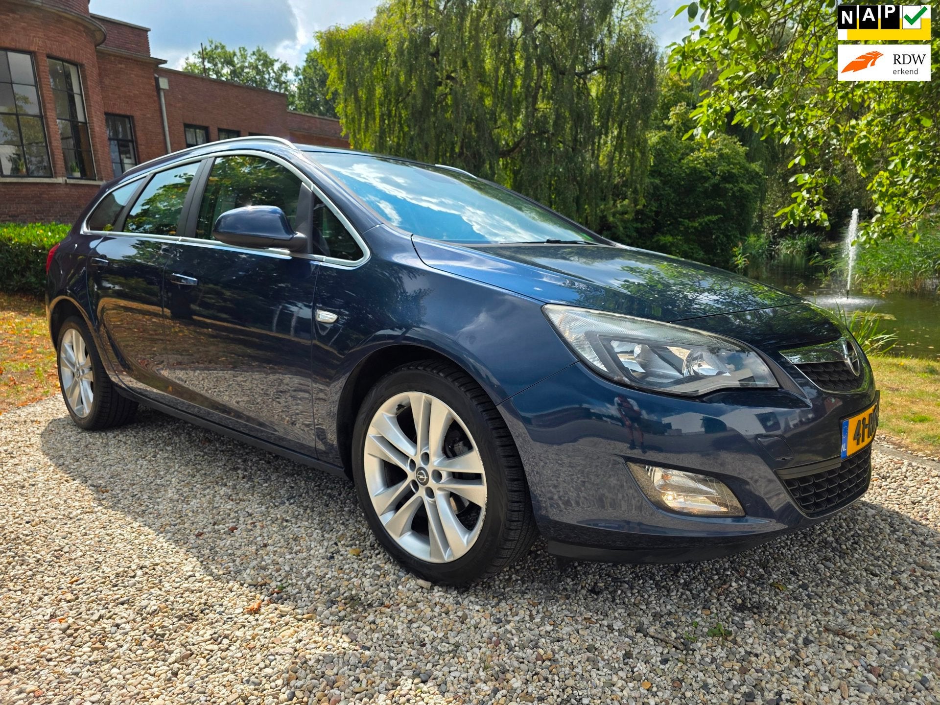 Opel Astra Sports Tourer 1.4 Turbo Sport, Auto's, Voorwielaandrijving, Euro 5, Automatische klimaatregeling, Gebruikt