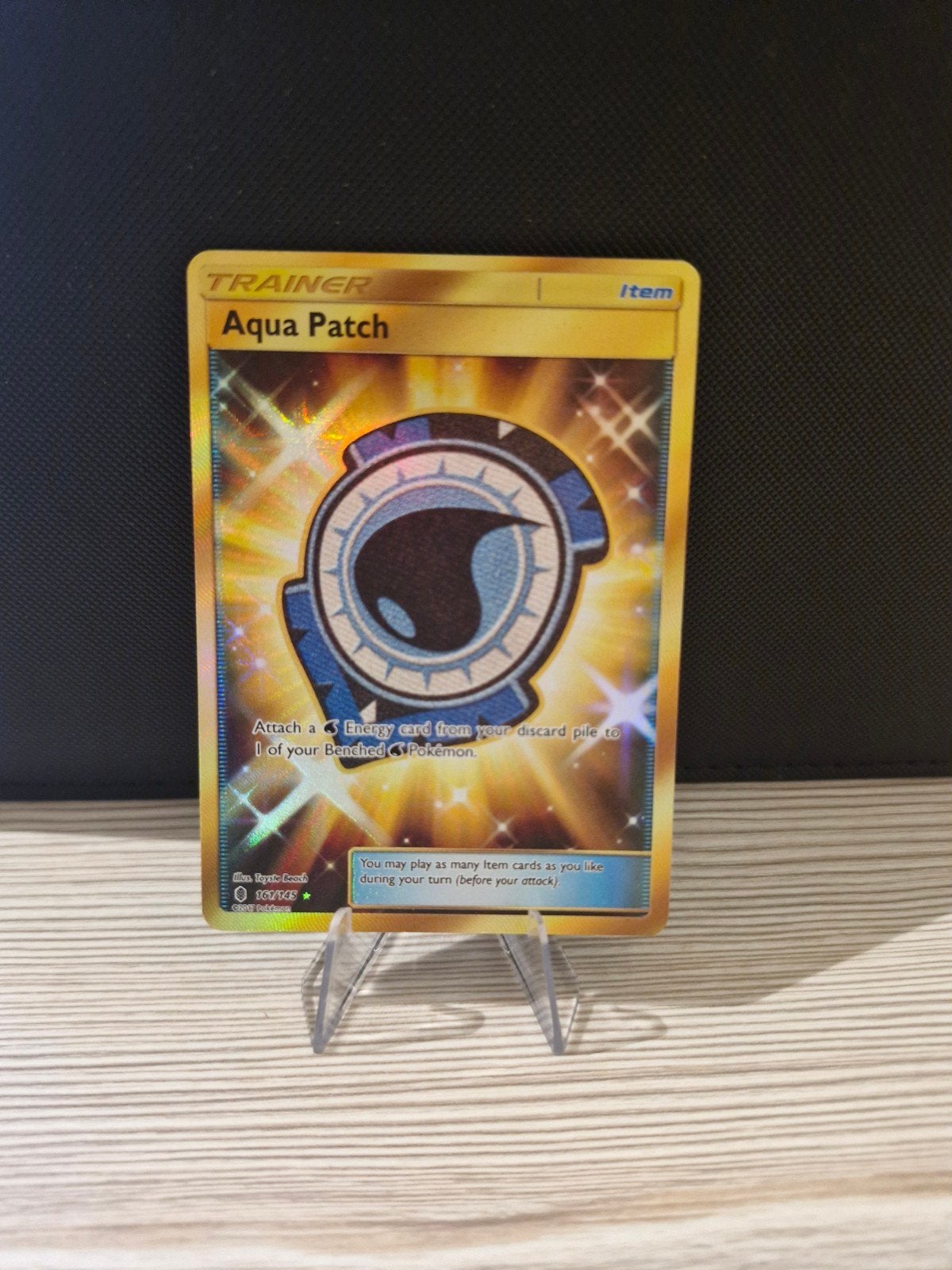 Pokémon TCG: Aqua Patch (Gold Secret Rare), Ophalen of Verzenden, Zo goed als nieuw, Losse kaart, Foil