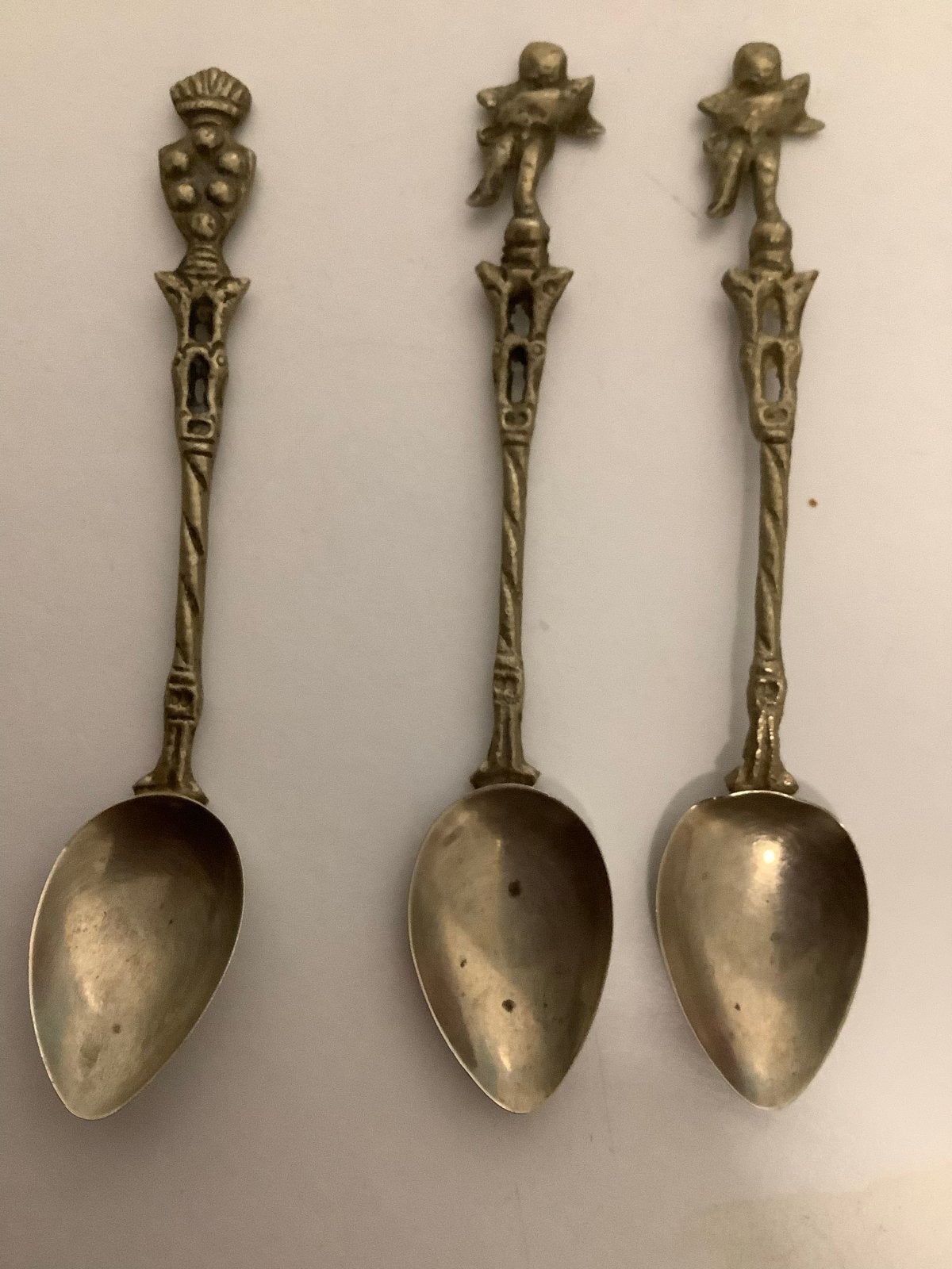 Set van 4 antieke verzamellepels met figuren, Verzenden