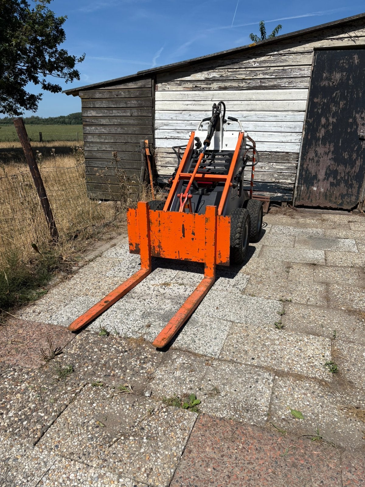 Te koop minni schovel skitster merk wiljam  vl 100, Ophalen, Zo goed als nieuw