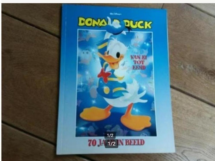 Donald Duck, 70 jaar in beeld, Boeken, Stripboeken, Eén stripboek, Ophalen of Verzenden, Zo goed als nieuw